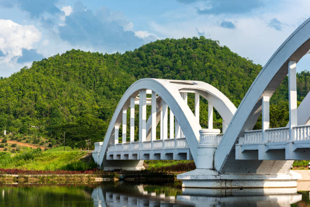 istock Old white railway bridge constructed at Lamphun, Thailand. 1055104968