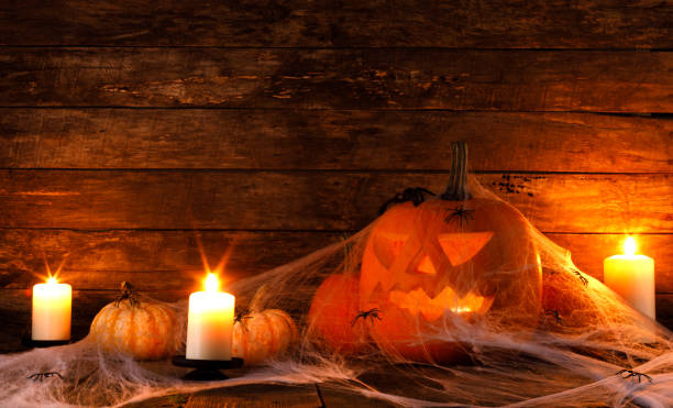 istock Halloween pumpkin and spiders 1055110436