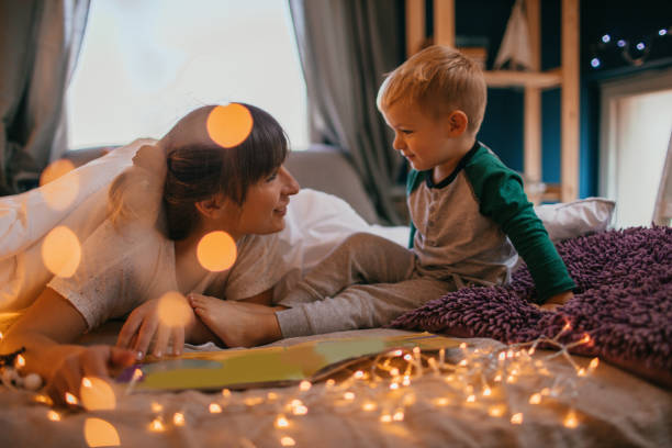 istock Mom is reading bedtime stories 1055113546