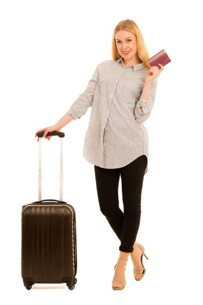 istock woman with suitcase travelling isolated over white background 1055113638