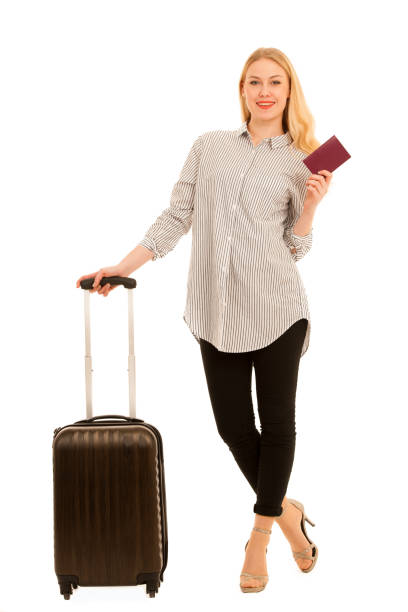 istock woman with suitcase travelling isolated over white background 1055113714