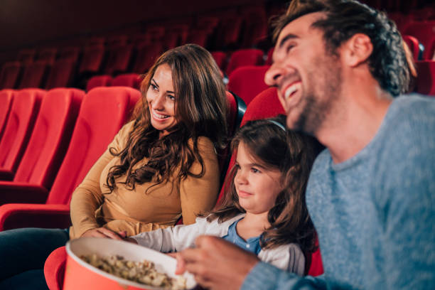 istock Young family at cinema 1055119376