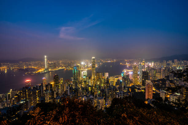 istock High Angle View Of Illuminated City Buildings At Night 1055124228
