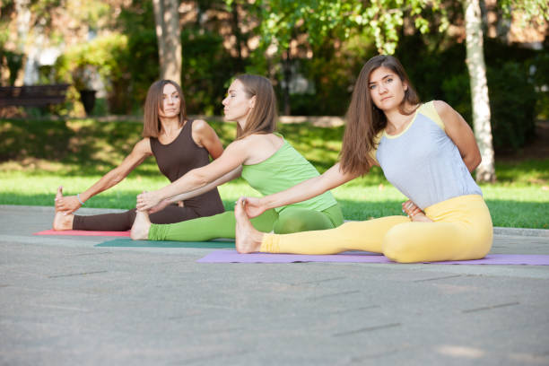 istock Practicing of yoga outdoors. 1055128464