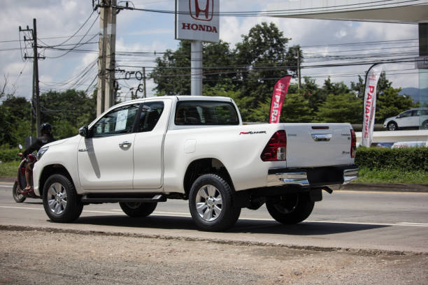 Private Pickup Truck Car New Toyota Hilux Revo  Rocco Chiangmai, Thailand - September 20 2018: Private Pickup Truck Car New Toyota Hilux Revo  Rocco. On road no.1001, 8 km from Chiangmai city. toyota hilux stock pictures, royalty-free photos & images