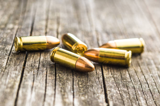 9mm Pistol Bullet Stock Photo - Download Image Now - Rifle, Bullet, Table - iStock 9mm Pistol Bullet Stock Photo - Download Image Now - Rifle, Bullet, Table - iStock