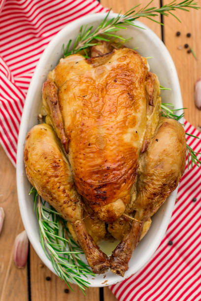 istock Oven baked roasted chicken with garlic 1055137854