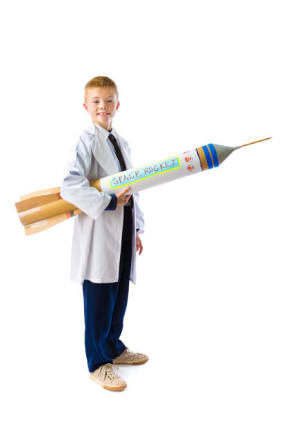 istock Young Boy Career Aspiration of Rocket Scientist on White Background 1055140780