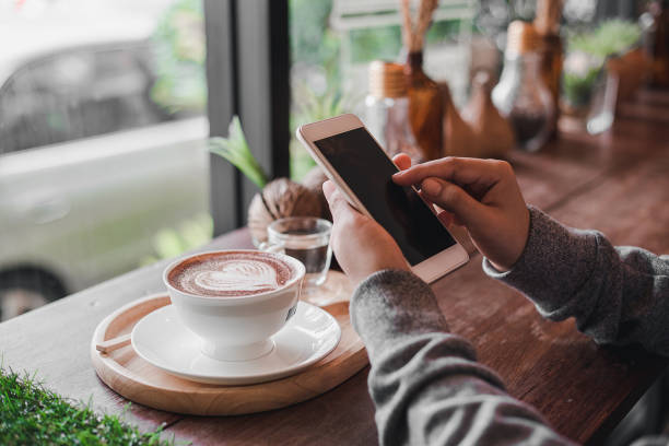istock Lifestyle of people using internet at coffee shop 1055141640