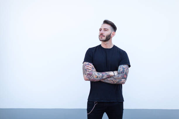 istock Portrait of tattooed young man 1055150108