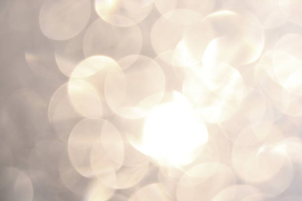 istock Abstract golden bokeh background texture 1055153998