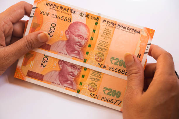 istock Image of indian new currency notes of 200 1055154388