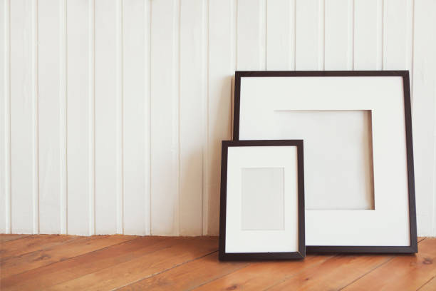 istock Two posters on the wooden floor by the white wall 1055158208