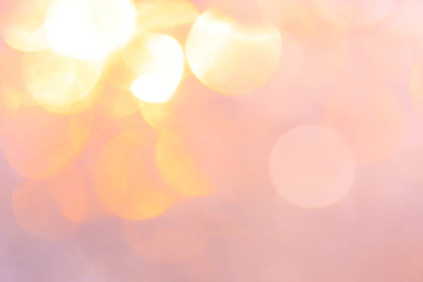 istock Abstract gold and orange bokeh background texture 1055170680