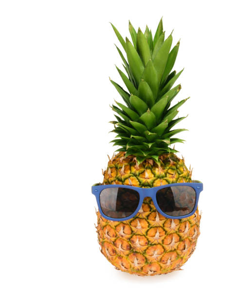 istock Pineapple in sunglasses isolated on white 1055178608