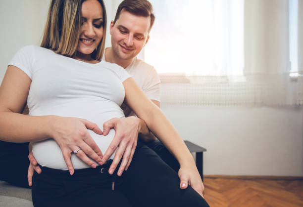 istock Happy couple expecting baby 1055180972