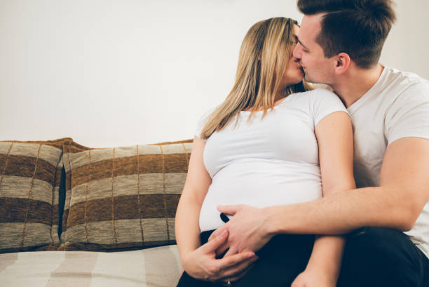 istock Happy couple expecting baby 1055184002