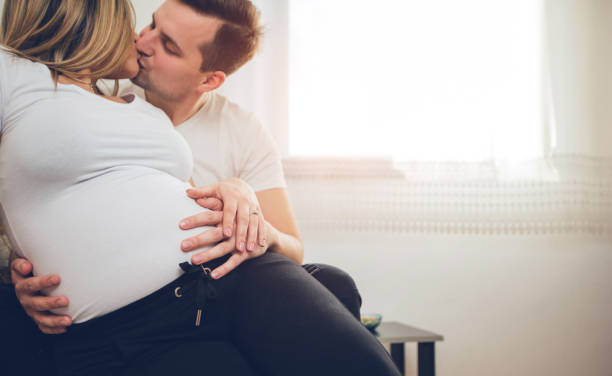 istock Happy couple expecting baby 1055184968