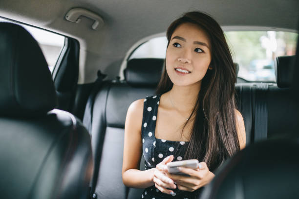 istock Young traveller sitting in a car 1055186482