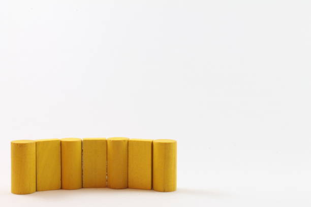 diverse compositions with colored wooden architecture game pieces