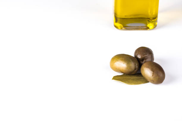 istock olive oil with olives 1055191018