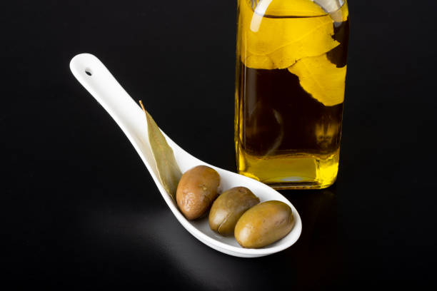 istock olive oil with olives 1055191042