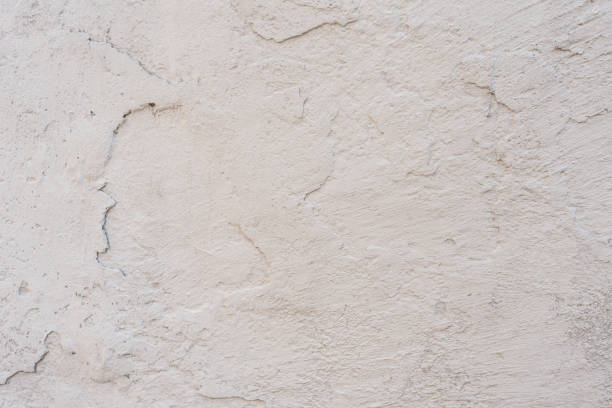 istock Wall fragment with attritions and cracks 1055197610