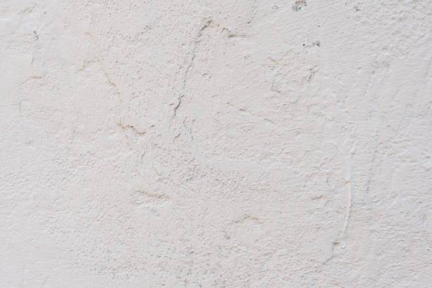 istock Wall fragment with attritions and cracks 1055197616