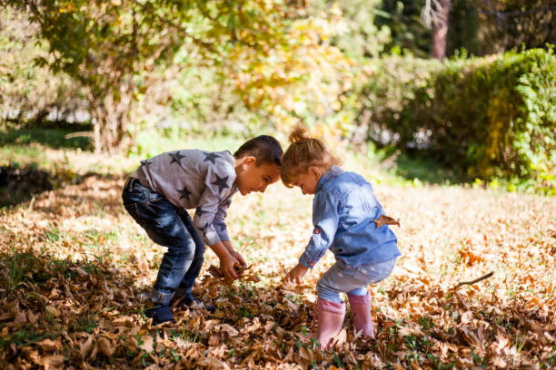 istock brother and sister having fun outdoors 1055211004
