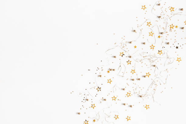 istock Christmas composition. Christmas golden decorations on white background. Flat lay, top view, copy space 1055213650
