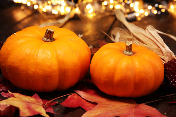 istock Diverse assortment of pumpkins on rustic table. Autumn harvest 1055225506
