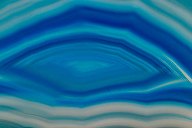 istock Macro mineral stone Blue Agate breed a white background 1055237416