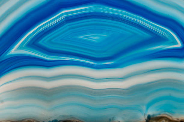 istock Macro mineral stone Blue Agate breed a white background 1055237692