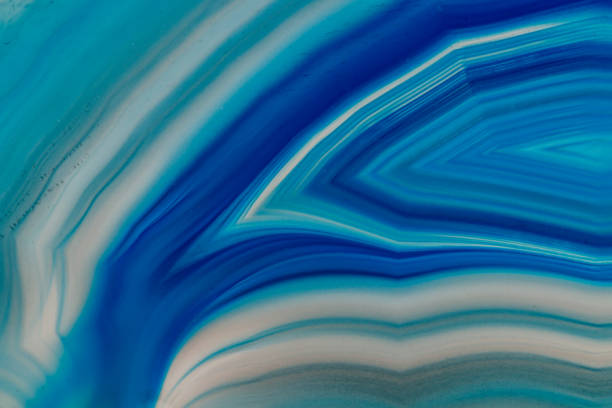 istock Macro mineral stone Blue Agate breed a white background 1055238298