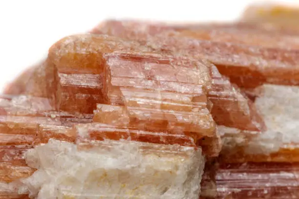 Photo of Macro mineral stone Tourmaline in the breed a white background