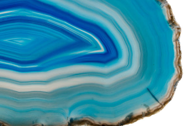 istock Macro mineral stone Blue Agate breed a white background 1055238490