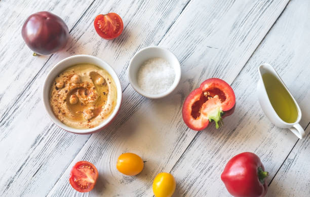 Bowl of hummus with fresh vegetables