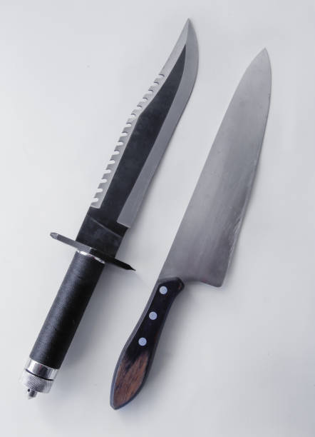 istock large kitchen knives and hunting knife 1055243520