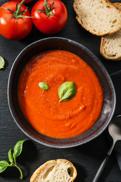 istock Creamy tomato soup served in bowl 1055246680