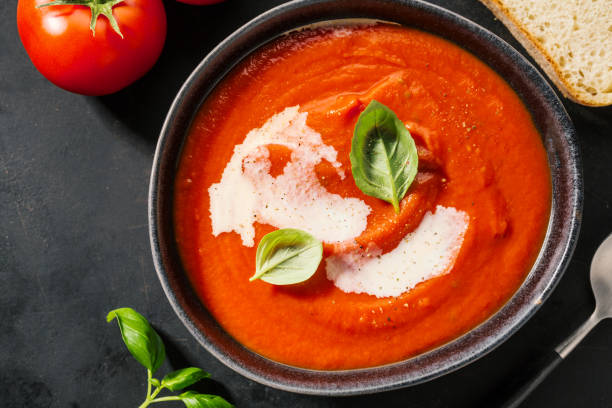 istock Creamy tomato soup served in bowl 1055249348