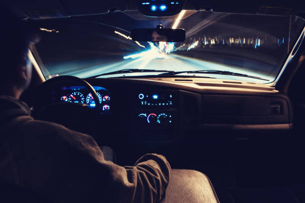 night driver - car dashboard night driving imagens e fotografias de stock