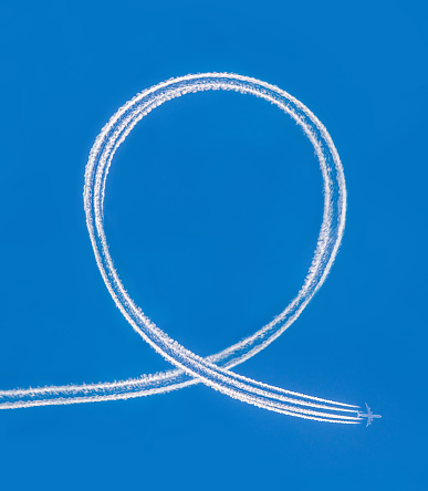 Loop, contrails and airplane. Fun, play