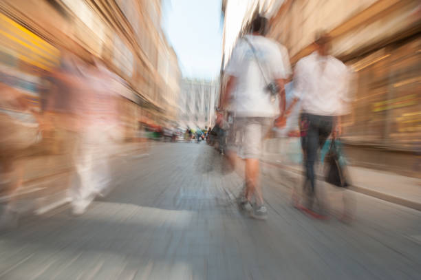 istock People crossing street, motion blur 1055252332