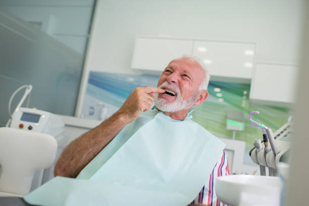 istock Senior man at the dentist 1055256162