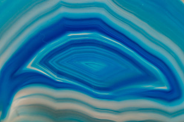 istock Macro mineral stone Blue Agate breed a white background 1055260112