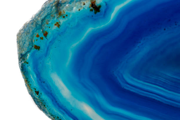 istock Macro mineral stone Blue Agate breed a white background 1055260160