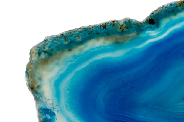 istock Macro mineral stone Blue Agate breed a white background 1055260786