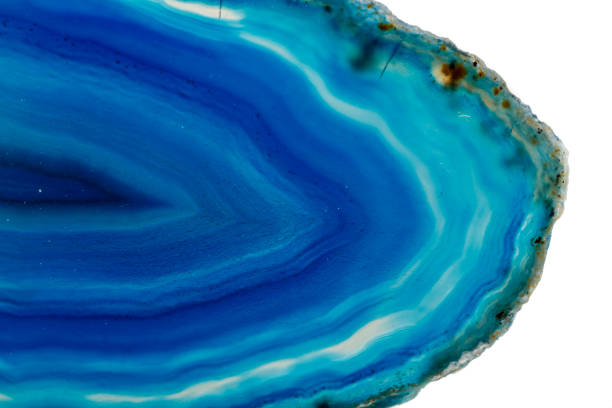 istock Macro mineral stone Blue Agate breed a white background 1055260834