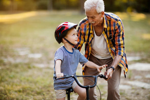 istock Grandchild-grandfather bonding 1055260846
