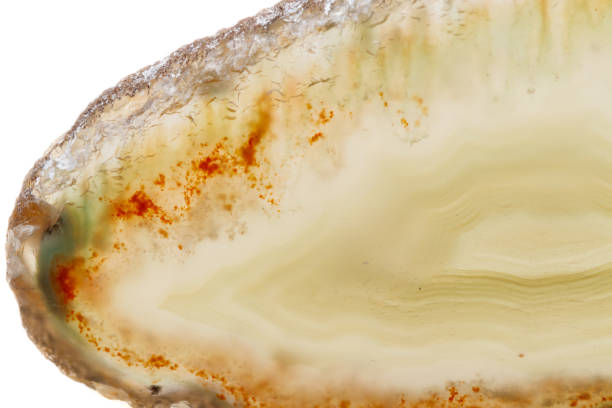 istock Macro mineral stone Yellow Agate breed a white background 1055261142